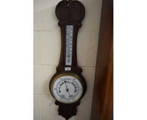 LATE 19TH CENTURY OAK CASED ANEROID BAROMETER AND THERMOMETER COMBINATION