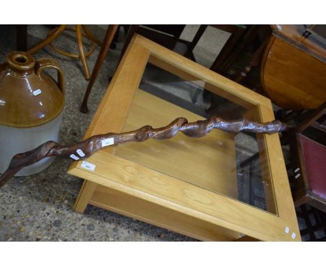 UNUSUAL WALKING STICK FORMED FROM A KNARLED TWISTED PIECE OF WOOD