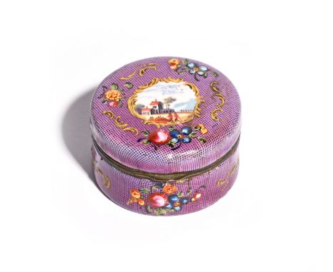 A Bilston enamel circular snuff box c.1780, painted with a small panel of two figures before buildings within a scroll border