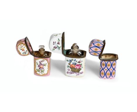 Three English enamel scent bottle holders  c.1760-80, of flattened rectangular form, one painted with panels of flowers reser