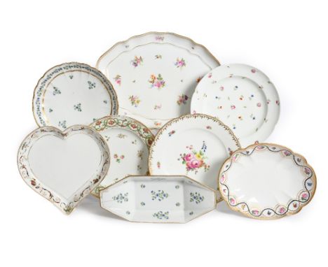 Seven Paris porcelain plates and dishes  late 18th/19th century, including Nast, Rue Thiroux and Clignancourt, variously deco