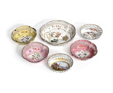 Six English enamel gaming baskets c.1770-80, three of shaped quatrefoil form, the interiors painted with playing cards and fl