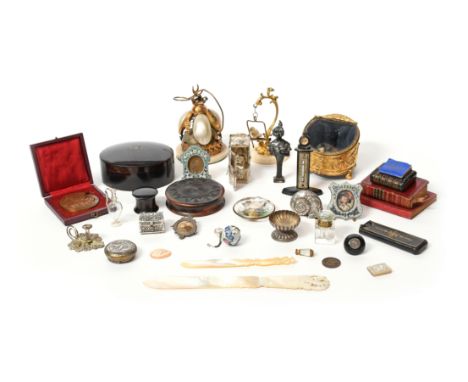 λ A mixed lot of objects of vertu, various materials, including: a French gilt metal and mother-of-pearl table bell, two micr