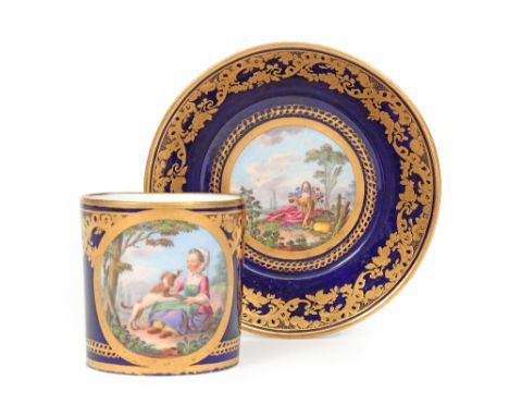A Sèvres coffee can and saucer (gobelet litron et soucoupe)  date code for 1776, painted by Charles-Nicolas Dodin, the can wi