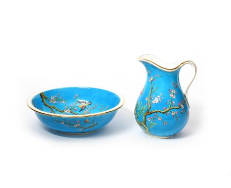 A large Minton ewer and basin  late 19th/20th century, decorated in the Aesthetic manner with sprays of flowering prunus on a