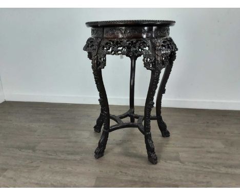 CHINESE HARDWOOD JARDINIERE STAND, 20TH CENTURY the top inset with rouge marble panel, with pierced and moulded floral and sc
