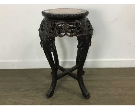 CHINESE HARDWOOD JARDINIERE STAND, 20TH CENTURY the top inset with rouge marble panel, with pierced floral and scroll detail,