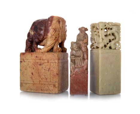 GROUP OF THREE CHINESE SOAPSTONE SEALS LATE 19TH/EARLY 20TH CENTURY the largest depicting an elephant, posed on a square base