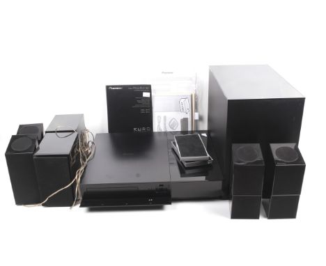 A Pioneer DVD/CD XV-LX03 with surround sound speaker system. Including subwoofer SSP-LX03, etc. Max. H32cm (No remote).