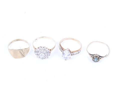 Four various vintage 9ct gold rings. Comprising; a 9ct gold oblong signet ring; a damaged 9ct gold and oval pale-blue single 