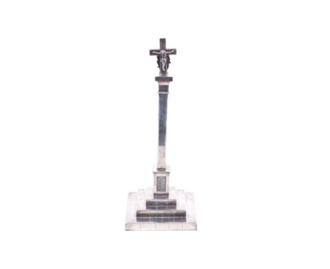 A Spanish white metal alter stick by Ramon Fernandez, Vigo. With a Latin cross, Madonna and child finial, a square column and