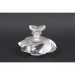 A Lalique Samoa France perfume bottle 'ocean wave and shell' design.