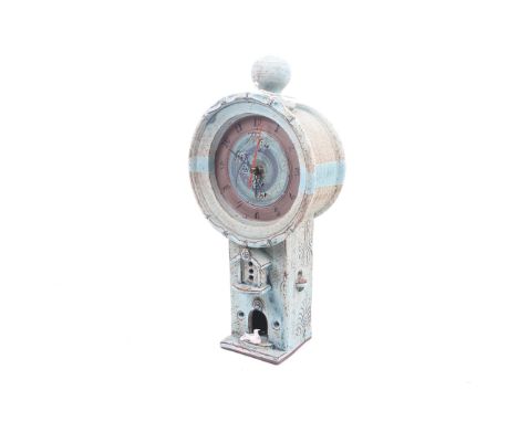 A pale green art studio pottery mantel 'tower' clock. With a quartz movement. Approx. 35cm high overall