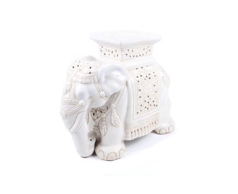 A 20th century Chinese ceramic elephant plant stand or garden seat. H43cm