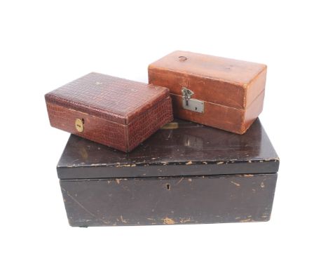 A group of three assorted vintage boxes. Including an empty cutlery canteen and two leather jewellery boxes. Max. L48cm x D34