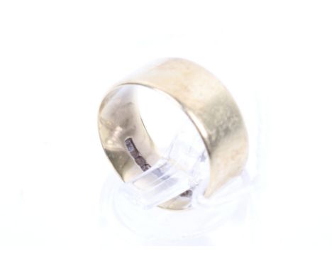 A vintage 18ct gold broad wedding band. Hallmarks for Birmingham 1969, 7.5mm wide, size leading-edge M, 3.7g