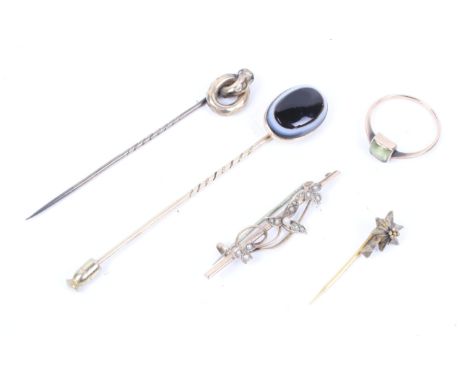 A small collection of jewellery to include a late Victorian gold mounted oval agate stick pin. Two other stick pins; a square