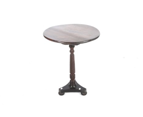 A mahogany and pine wine table. With a later pine top, elaborately twist carved column, tripod base with reeded bun feet. H68