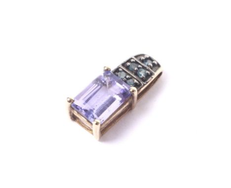 A vintage tanzanite and diamond pendant. The rectangular step-cut tanzanite claw set below five tiny irradiated-blue diamonds