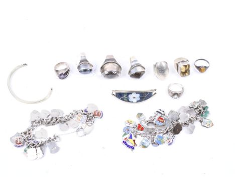 Eight silver and white metal dress rings set with semi-precious hardstones. Two two silver and enamel 'charm' bracelets, each