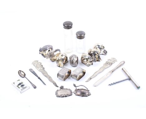 A small collection of silver and white metal including seven plated African animal and bird napkin rings. Together with two s