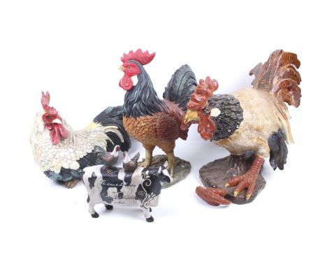 Three life size decorative roosters figures. Including one ceramic, etc. Max. H40cm