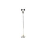 A circa 1980s chrome uplighter with tulip shade. Circular base and a chrome tulip shade.