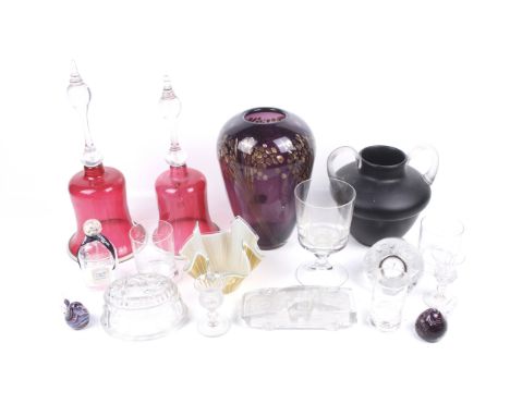 A collection of assorted glass. Including a cream 'tissue' glass bowl, a Waterford glass desk clock, two ruby glass bells and