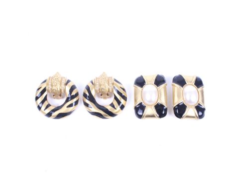 Two pairs of gold-plated and black enamel designer ear clips. Comprising; an oblong pair by Givenchy, each centred with an ov