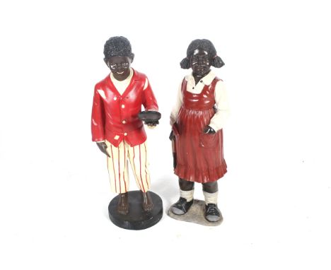 Two vintage fibreglass figures of children. One of a girl holding a skipping rope, the other of a boy holding a plate, both d