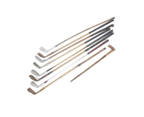 A collection of vintage hickory shaft golf clubs. Including a Poweflex Slazenger 