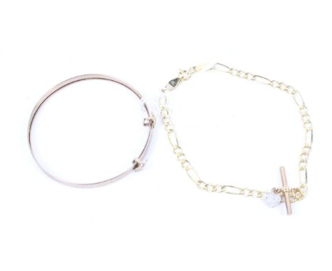 A vintage 9ct gold small expanding bangle and an Italian 9ct gold fetter and three curb bracelet. On a bolt-ring clasp, Londo