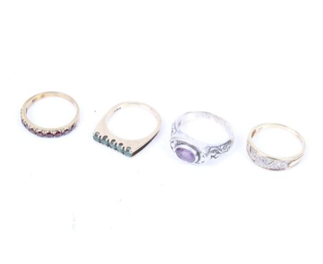 Three vintage 9ct gold and gem set rings and a white metal and amethyst single stone ring. Comprising; a round mixed-cut emer