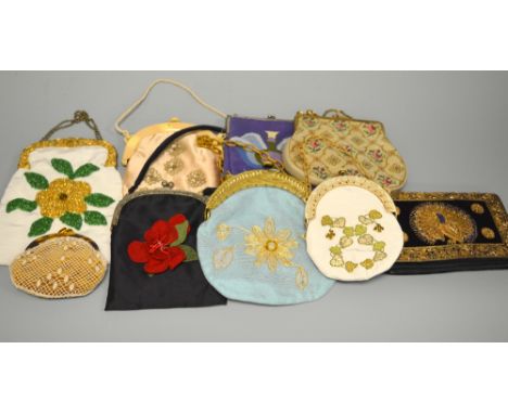 A COLLECTION OF VINTAGE HANDBAGS, to include hand stitched tapestry bags, some bags with hand embroidery and lace work (8)