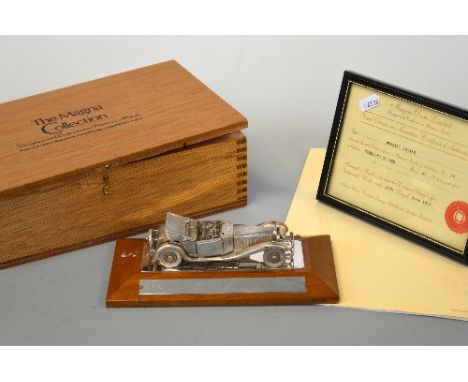 A 1970'S LIMITED EDITION HALLMARKED STERLING SILVER 1/50th SCALE MODEL OF A BUGATTI ROYALE, by Magna Dove Ltd, with certifica