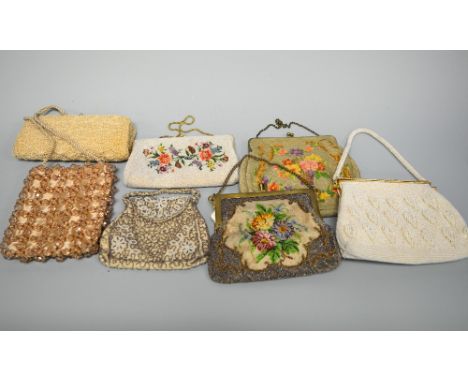 A COLLECTION OF VINTAGE HANDBAGS, to include hand stitched tapestry bag, together with beaded handbags and an evening clutch 