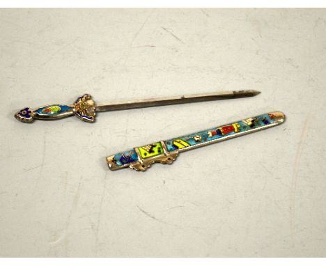 AN ORIENTAL COLOURED ENAMEL MOUNTED WHITE METAL LETTER KNIFE, with vase, flower and furniture decoration, approximate length 