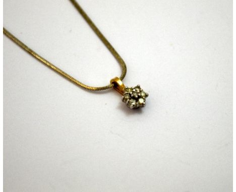 A DIAMOND PENDANT, with brilliant-cut diamonds, within a snowflake shape design, estimated total diamond weight 0.20ct, to a 