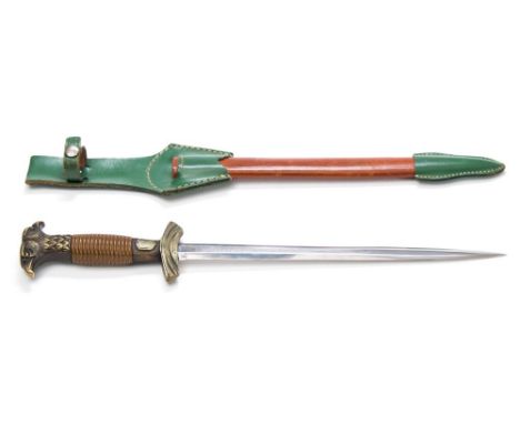 A 20th century German dagger by Koller:, the straight double edge blade with maker's mark over a cast brass hilt with downswe