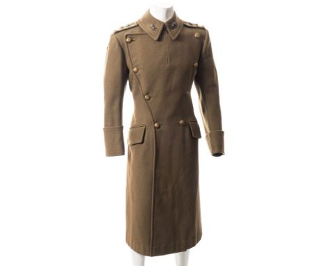 A WWII period Royal Army Service Corps green woollen overcoat:, with appropriate brass shoulder badges and button etc.