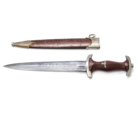 A Third Reich period SA dagger by E P & S:, double edged blade with inscription to one side and maker's mark to the other, pl