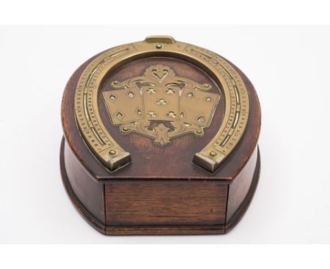 An early 20th century oak and brass mounted horseshoe shaped cribbage board and card box:, fitted single drawer to top end, 1