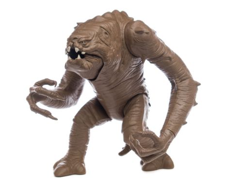 A Star Wars 'Return Of the Jedi' Rancor Monster Figure by Kenner in original first series box: with customer care slip. 