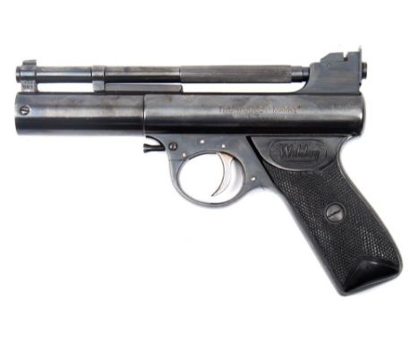 A Webley MK 1 post war air pistol:, .177 calibre with black chequered grips.