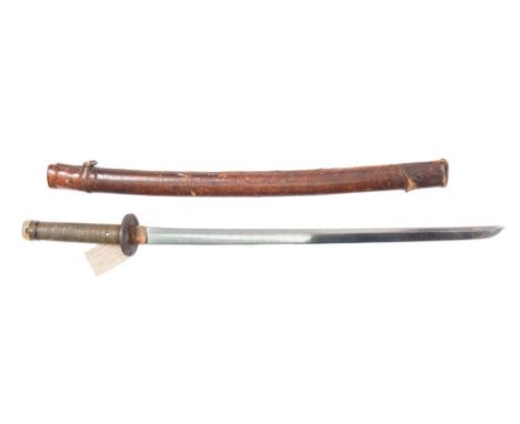 A  17th century Japanese katana by Izumi No Kami, Fujiwara:, the 61 cm blade, signed to the tang with circular iron tusba, co