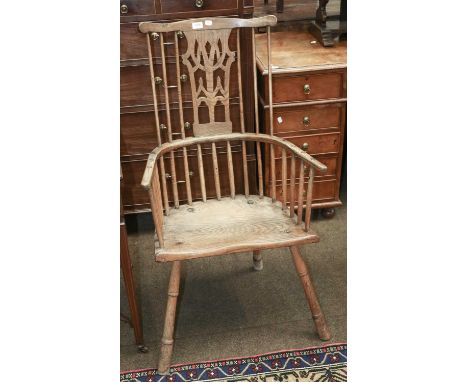 A 19th Century Provincial Ash and Elm Comb Back Windsor Chair, alterationsThe central three sticks have been replaced with a 