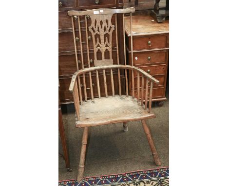 A 19th Century Provincial Ash and Elm Comb Back Windsor Chair, alterationsThe central three sticks have been replaced with a 