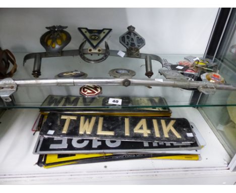 A QUANTITY OF VINTAGE CAR BADGES, NUMBER PLATES ETC. 