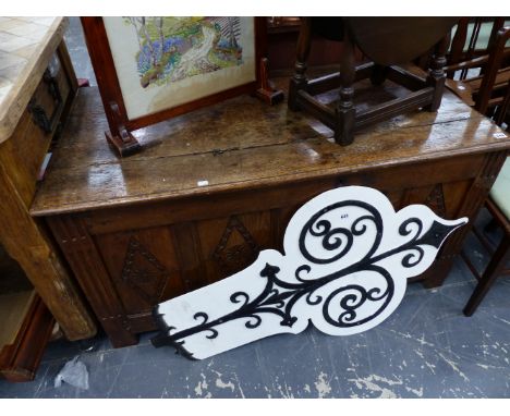 AN 18TH C. CARVED OAK COFFER WITH FOUR PANEL FRONT. 
