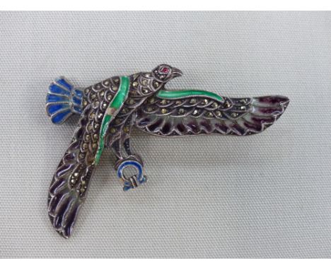 A VINTAGE PLIQUE A JOUR ENAMEL AND MARCASITE SET BIRD IN FLIGHT BROOCH.